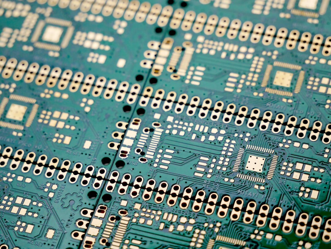 Electronic circuit board with IoT microchips and electronic components close up