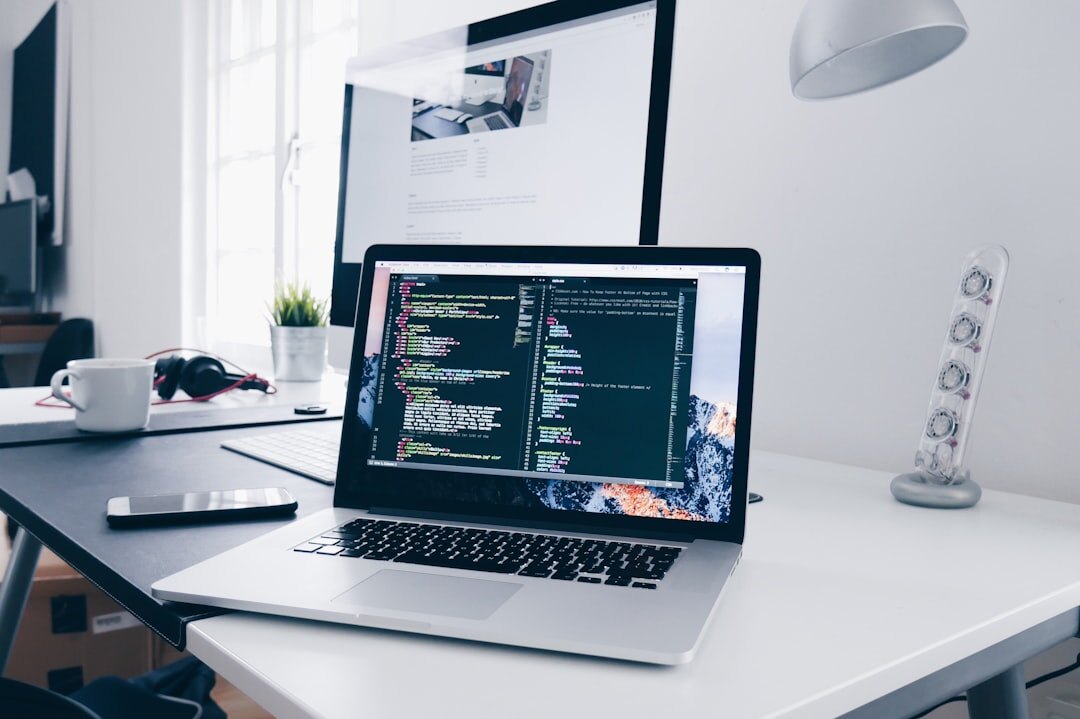 Modern technology workspace with laptop showing AI data analytics dashboard